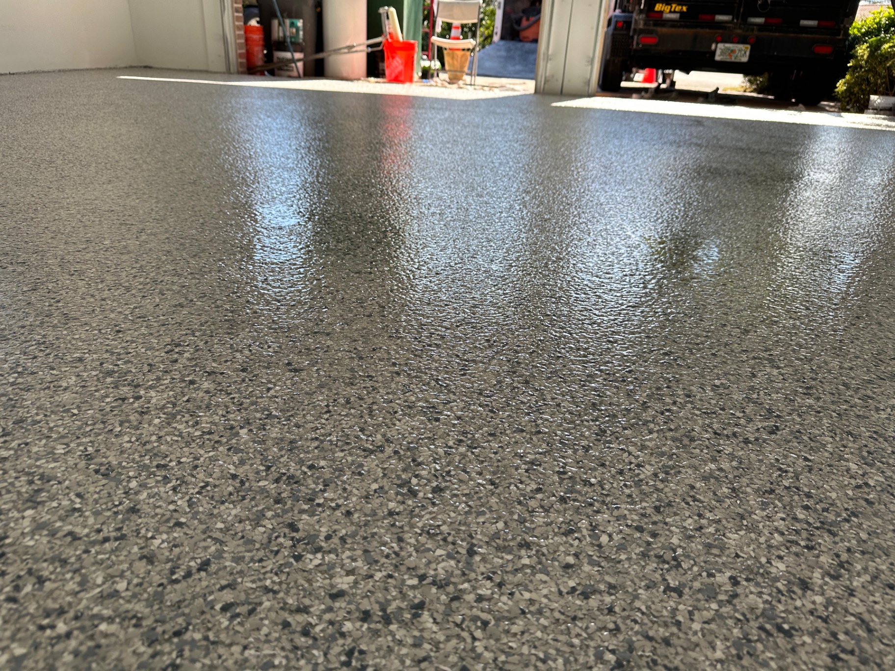 Close-up of glossy flake epoxy floor finish